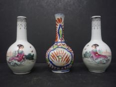 A pair of Chinese miniature vases, decorated with a lady in a garden setting, seal mark to bases,