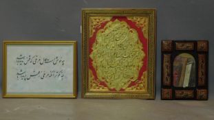 A Middle Eastern gilt inscription in Khatam inlaid frame, together with a framed inscription, and