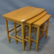 A teak nest of tables, H.53 W.66 D.44cm