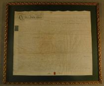 A large glazed and gilt framed indenture. signed and sealed. H.80 W.93cm