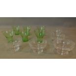 A set of 5 coloured highball glasses and 5 etched glass dessert bowls.