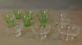 A set of 5 coloured highball glasses and 5 etched glass dessert bowls.