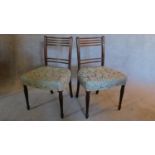 A pair of Georgian mahogany dining chairs. H.84 W.51 D.47cm