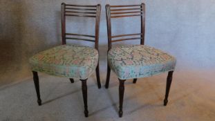 A pair of Georgian mahogany dining chairs. H.84 W.51 D.47cm