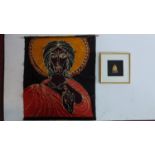 A framed and glazed carving of a deity and a religeous scroll. 72x62cm.