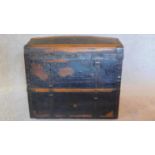 A vintage domed top cabin trunk with twin carrying handles. H.60 W.71 D.46cm