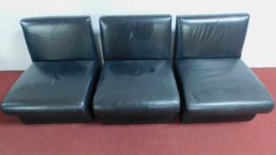 Three black leather easy chairs H.68 W.59 D.66cm