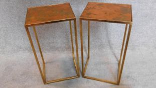 A pair of metal framed low tables with copper panel tops. H.57x30x26cm