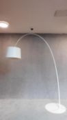 A floor standing arc style lamp. H.222cm