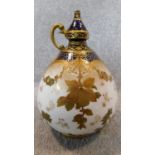 A 19th century Royal Crown Derby bulbous shaped flaggon. 24x18cm