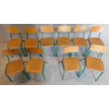 A set of 10 vintage childrens's metal framed stacking chairs with plywood seats and backs. H.53cm