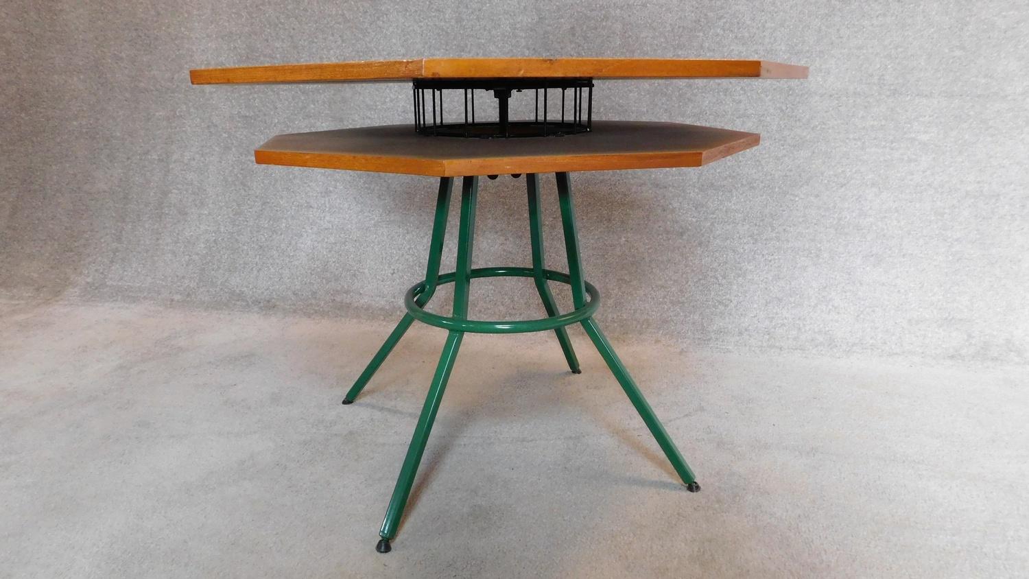 A mid 20th century teak octagonal topped two tier centre table on a green metal frame. H.70 W.92cm - Image 3 of 3