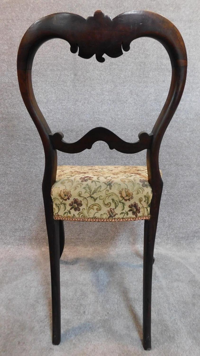 A set of four Victorian rosewood balloon back dining chairs H.84cm - Image 3 of 7