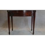 A Regency style mahogany flap top tea table. H.80 W.90 D.41cm