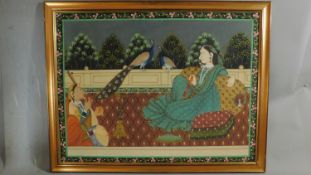 A large 20th century Indian gouache on silk, princess smoking a pipe, 64 x 84cm