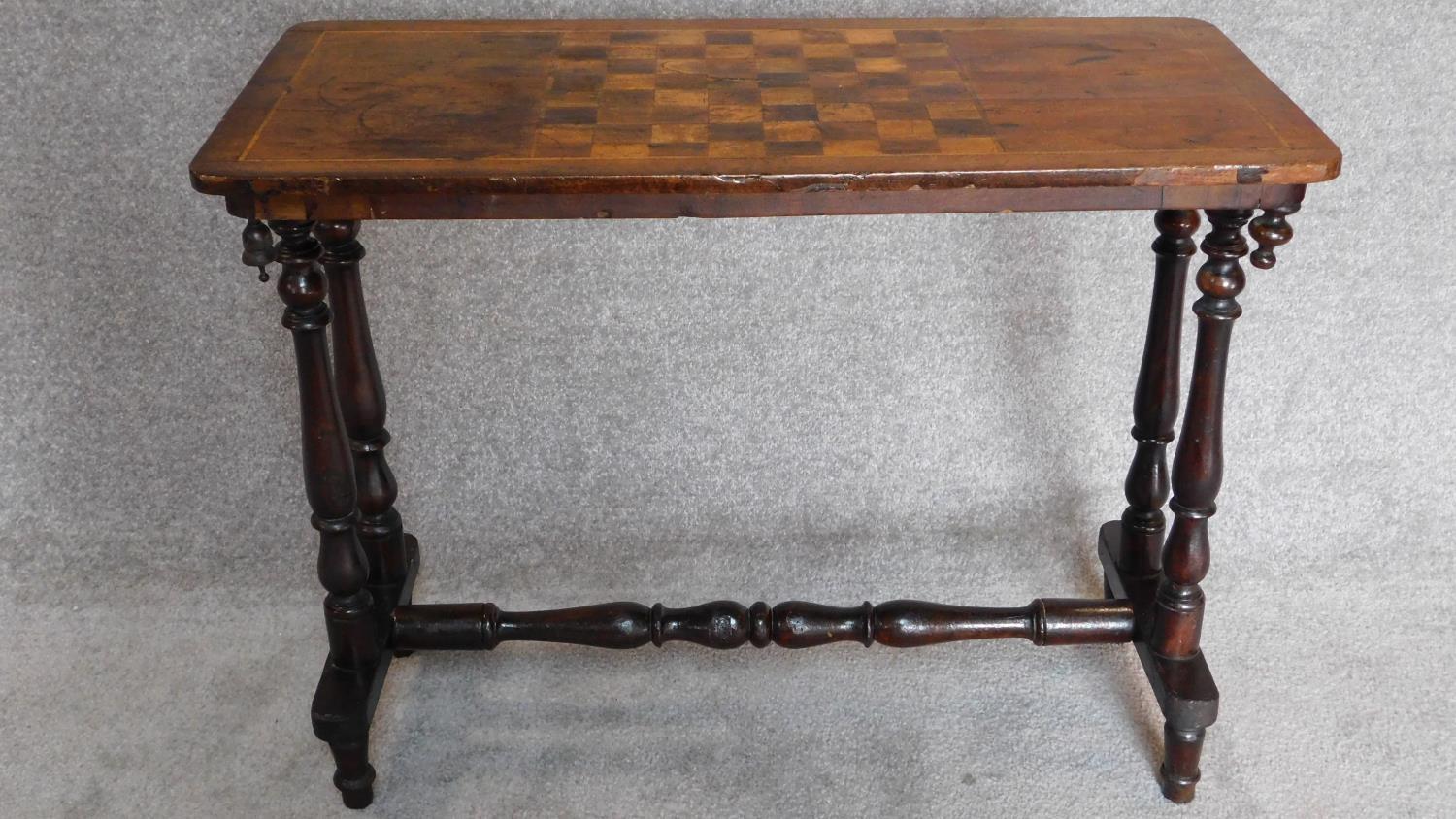 A Victorian mahogany and satinwood inlaid chess top table. 86x41cm