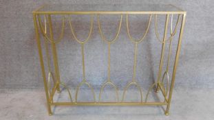 A gilt metal framed glass topped console table. 86x100x35cm