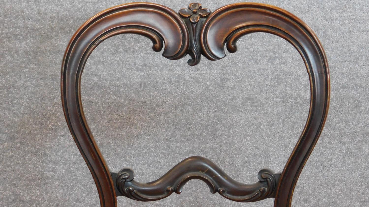 A set of four Victorian rosewood balloon back dining chairs H.84cm - Image 7 of 7