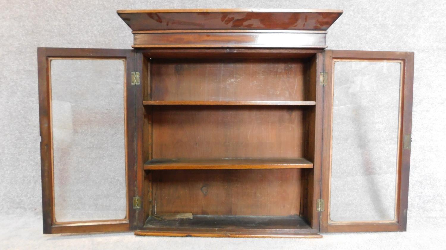 A 19th century mahogany glazed two door bookcase section. 72x69cm - Image 2 of 3