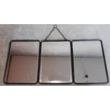 A metal framed triple section wall hanging mirror. 40x85cm