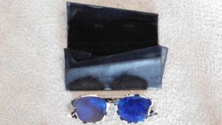 A pair of vintage cased Christian Dior sunglasses