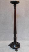 A Victorian carved mahogany torchere stand, H.136cm