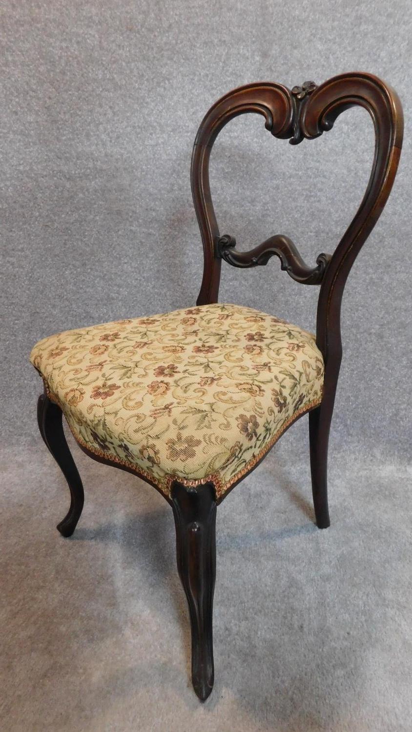 A set of four Victorian rosewood balloon back dining chairs H.84cm - Image 2 of 7