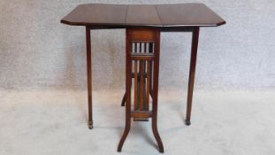 An Edwardian mahogany drop flap Sutherland table late 65x73x60cm