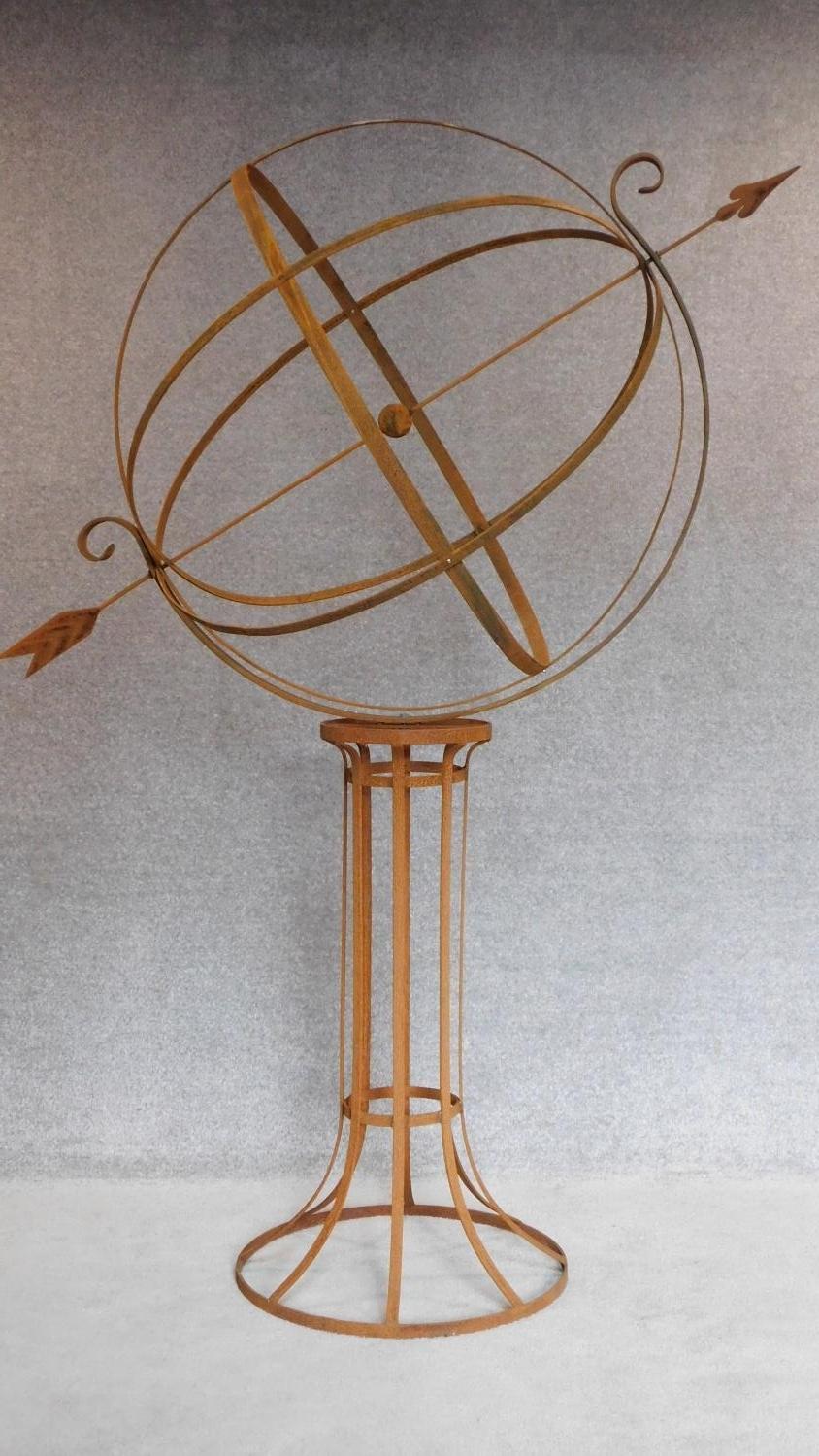 A large full height metal garden armillary sphere with revolving central globe. H.205cm