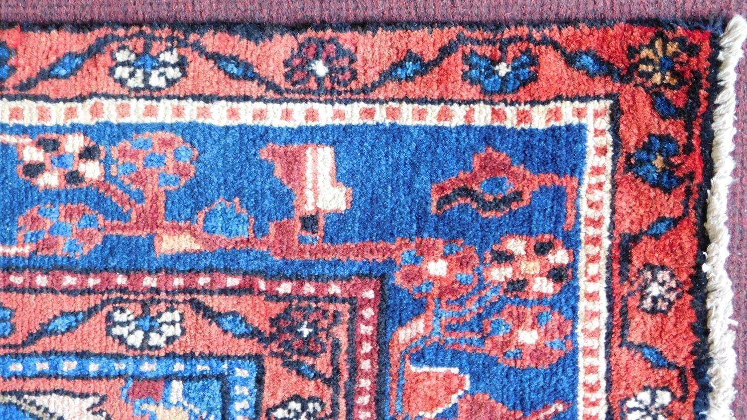 A north west Persian Nahawand carpet with central double pendant medallion with repeating petal - Image 4 of 4