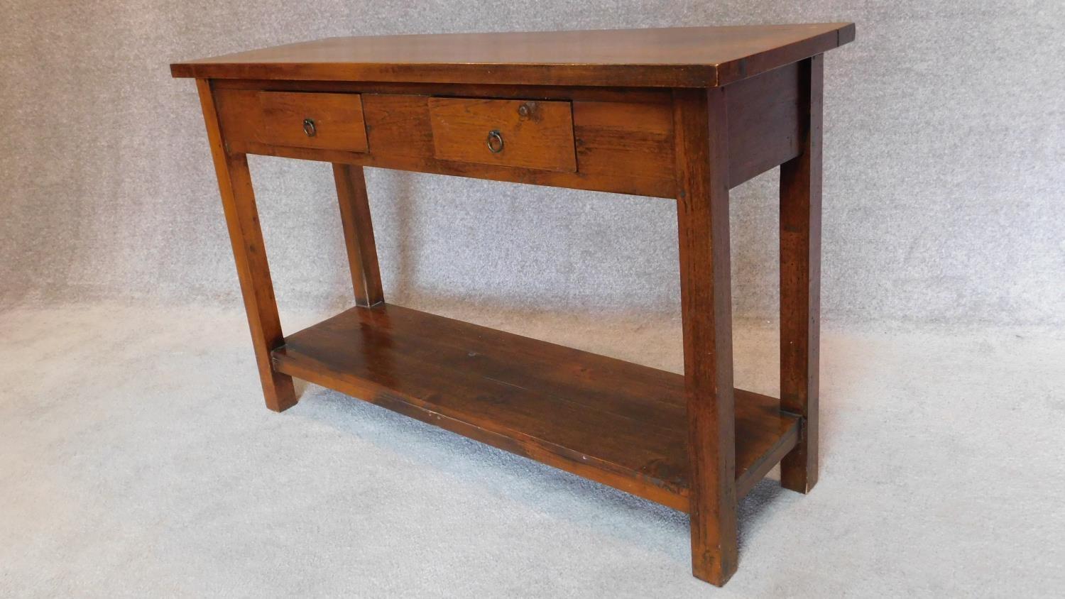 A contemporary teak console side table with two drawers on square supports joined by stretchered pot - Image 3 of 3