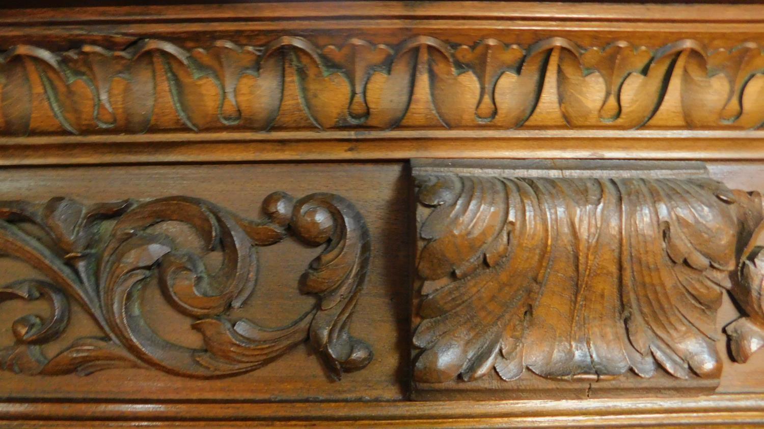 A 1930's German carved oak cabinet with burr walnut inlaid panel doors. H.185 W.233 D.40cm - Image 3 of 7