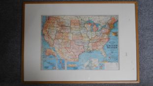 An oak framed and glazed Bacon's Standard map of the United States. 103x73cm