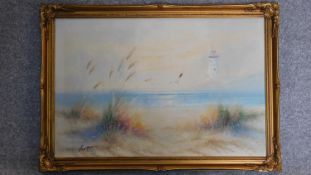 A vintage oil on canvas, lighthouse and dunes, signed. 60x85cm