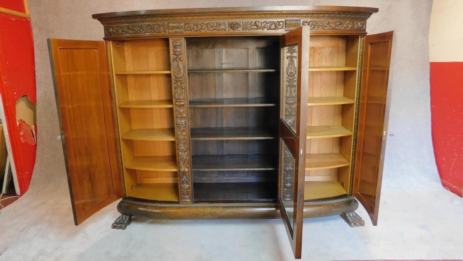 A 1930's German carved oak cabinet with burr walnut inlaid panel doors. H.185 W.233 D.40cm - Image 2 of 7