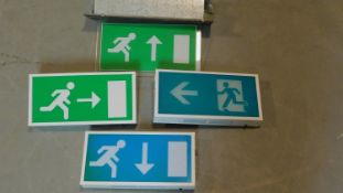 Five light up fire escape signs