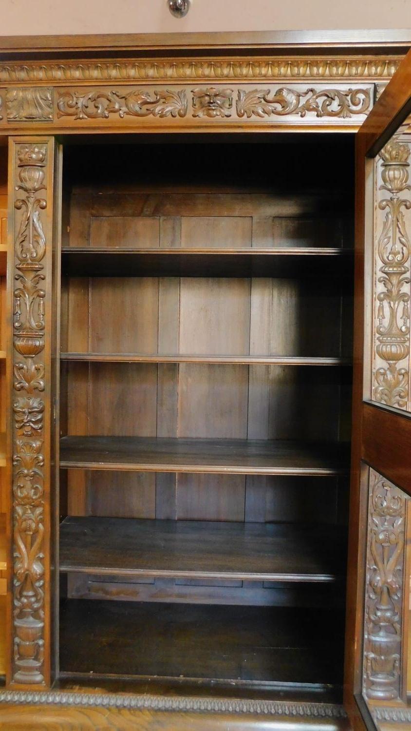 A 1930's German carved oak cabinet with burr walnut inlaid panel doors. H.185 W.233 D.40cm - Image 6 of 7