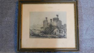 A framed and glazed pencil drawing of a castle, signed. 52x59cm