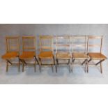 A set of three mid 20th century folding chairs by Fischel and another three similar chairs. H.85cm