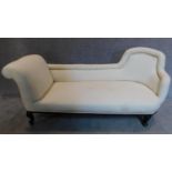 An Edwardian mahogany framed double ended chaise longue upholstered in calico. 80x173x70cm
