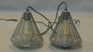 A pair of industrial style wire mesh cone shaped ceiling light pendants, H.26 D.25cm