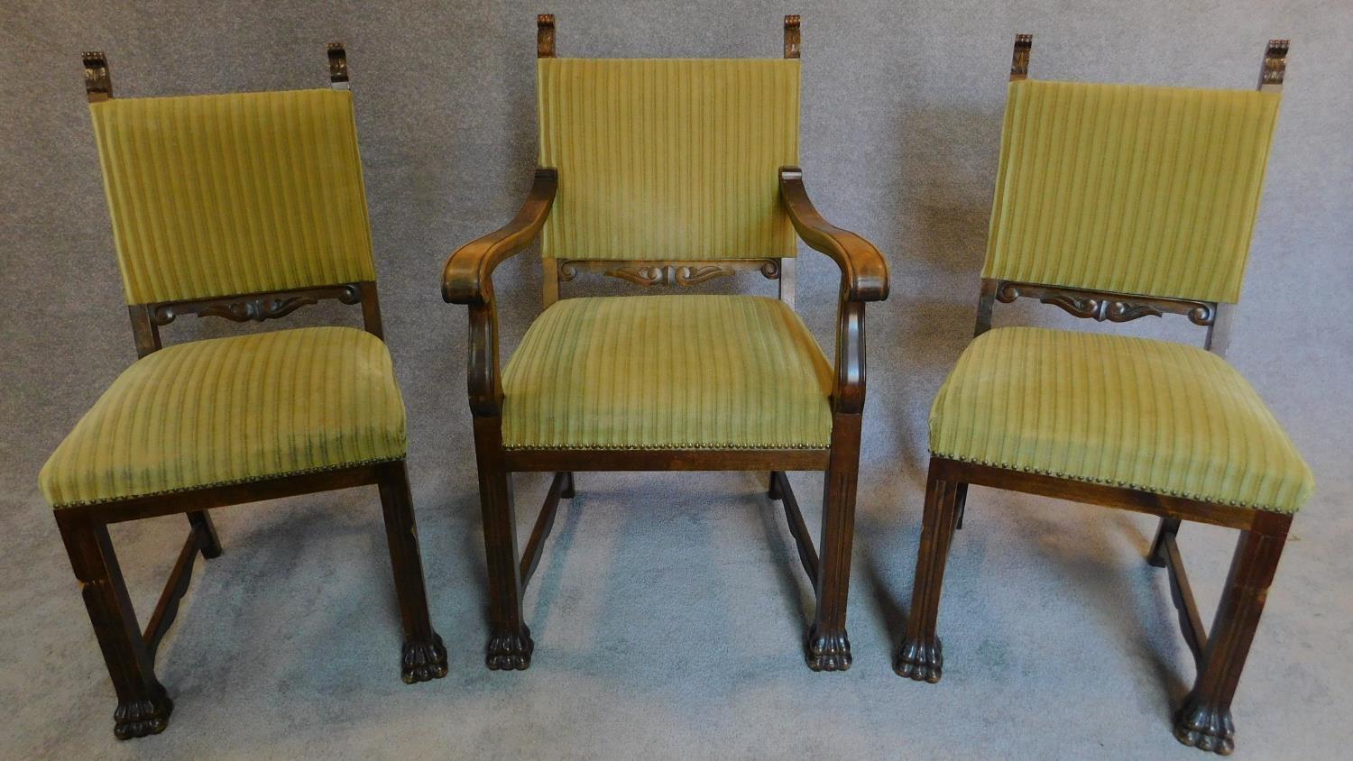 A 1930's German oak desk chair and a pair of matching side chairs. H.102 W.58 D.52