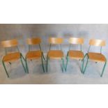 A set of five vintage children's metal framed stacking chairs with plywood backs and seats. H.67cm