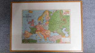 An oak framed and glazed Bacon's Standard map of Europe. 103x73cm