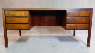 A 1960's rosewood desk, Model 77 by Omann Jun Mobelfabrik, designed by Gunni Omann, fitted