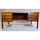 A 1960's rosewood desk, Model 77 by Omann Jun Mobelfabrik, designed by Gunni Omann, fitted