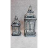 Two matching storm lanterns. 70x27cm (largest)