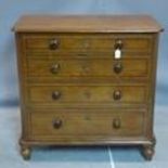 A Victorian painted grain chest of four long drawers H.92 W.94 D.48cm