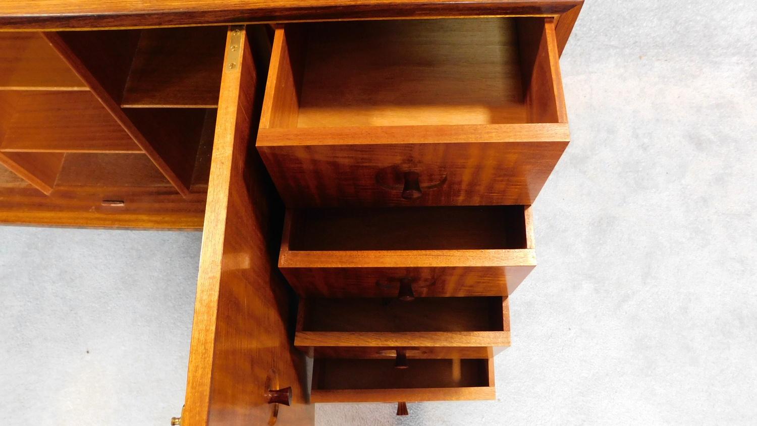 A Gordon Russell sideboard fitted drawers and cupboards on splayed supports, makers label to back. - Image 4 of 9