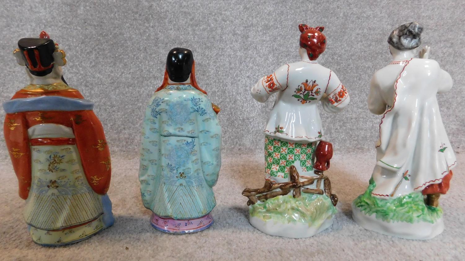 A pair of chinese figures and a pair of Russian similar. H.25cm - Image 7 of 7